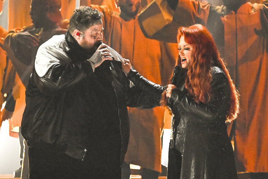 Jelly Roll and Wynonna Judd perform together on stage at the cma's