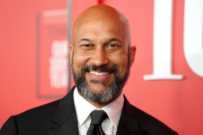 Keegan Michael-Key smiles on the red carpet during the TIME 100 gala