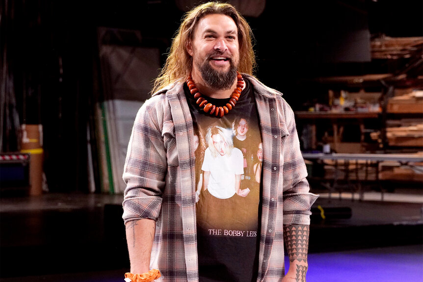 Jason Momoa on stage doing promos for Saturday Night Live Episode 1849