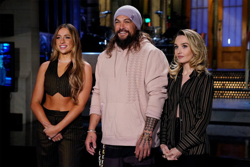 Jason Momoa Tate Mcrae and Chloe Fineman on stage for Saturday Night Live Promos