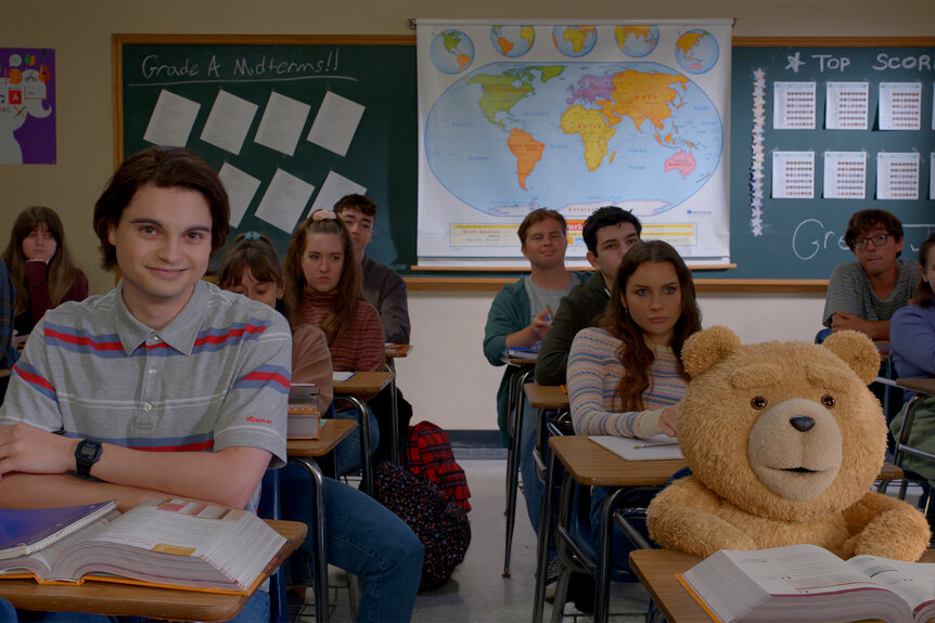 John and Ted sit in a classroom on Season 1 Episode 5 of TED
