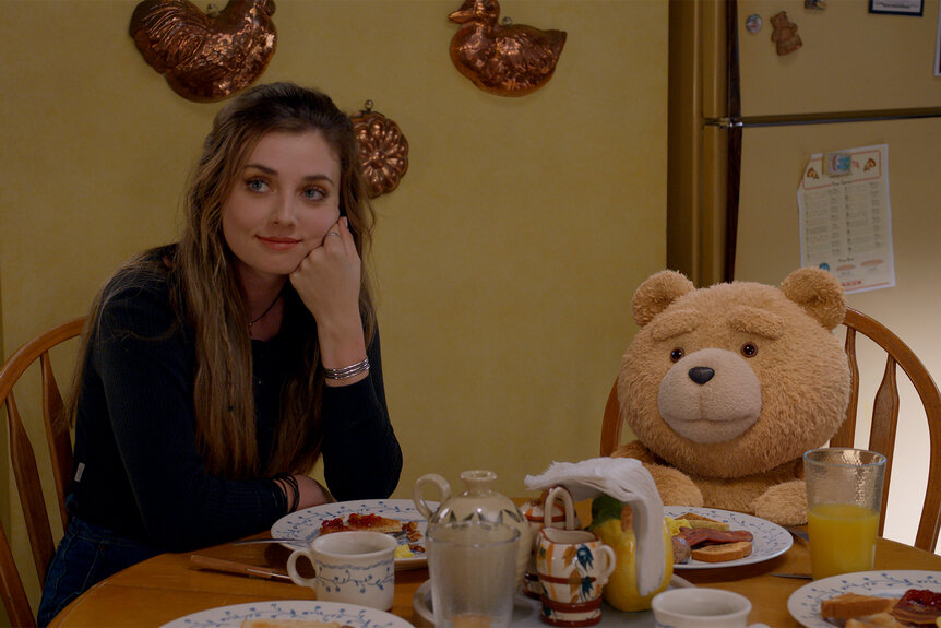 Blaire and Ted sit at the breakfast table on Season 1 Episode 7 of Ted