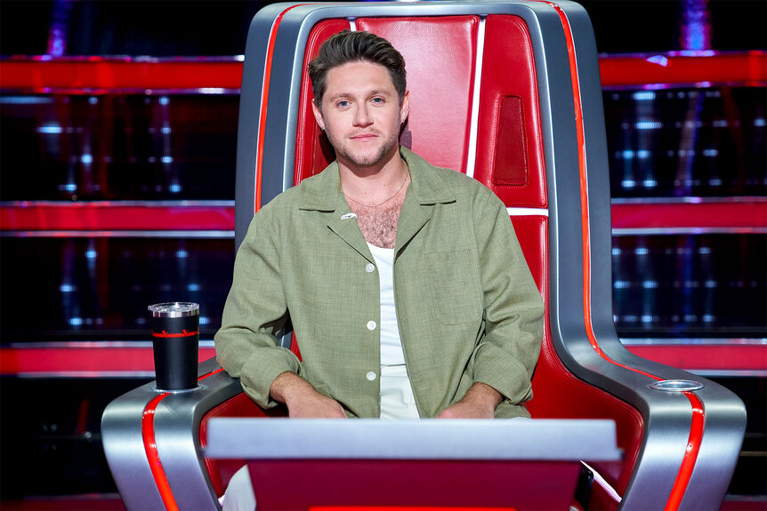 Niall Horan sits at his coaches chair on The Voice Episode 2418