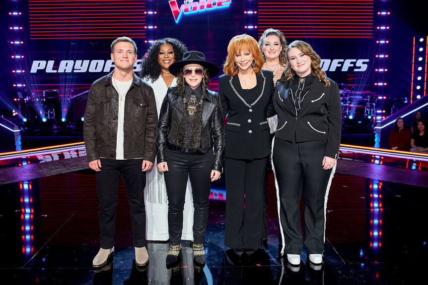Reba McEntire's team stands on stage during The Voice Episode 2418
