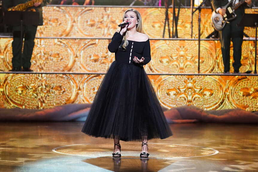 Kelly Clarkson performs on stage at Christmas At The Opry