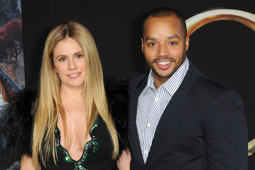 Cacee Cobb and Donald Faison arrive on a red carpet together