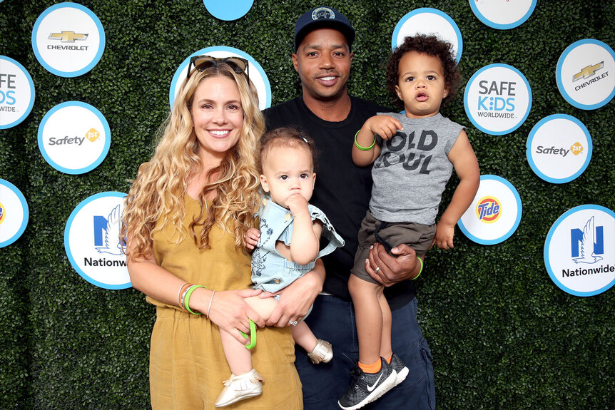 Cacee Cobb, Donald Faison, and their two children attend Safe Kids Day at Smashbox Studios on April 24, 2016 in Culver City, California.