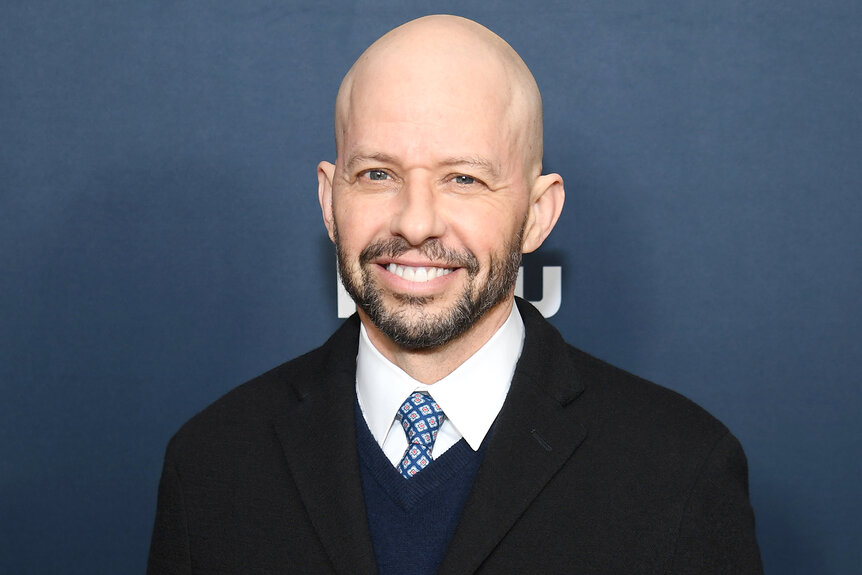 Jon Cryer smiles on the red carpet for the premiere of Big Time Adolescence
