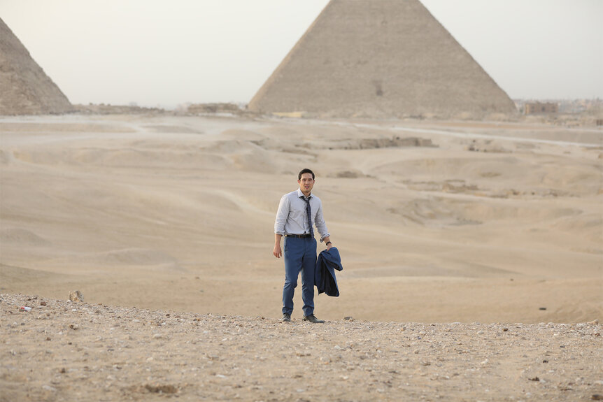 Dr. Ben Song stands in front of pyramids on Quantum Leap episode 208