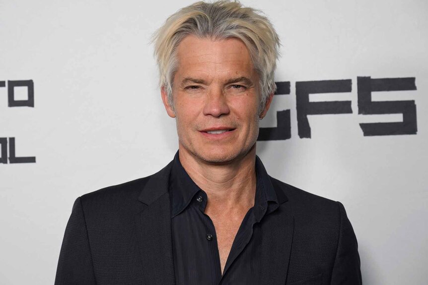 Timothy Olyphant wears all black.