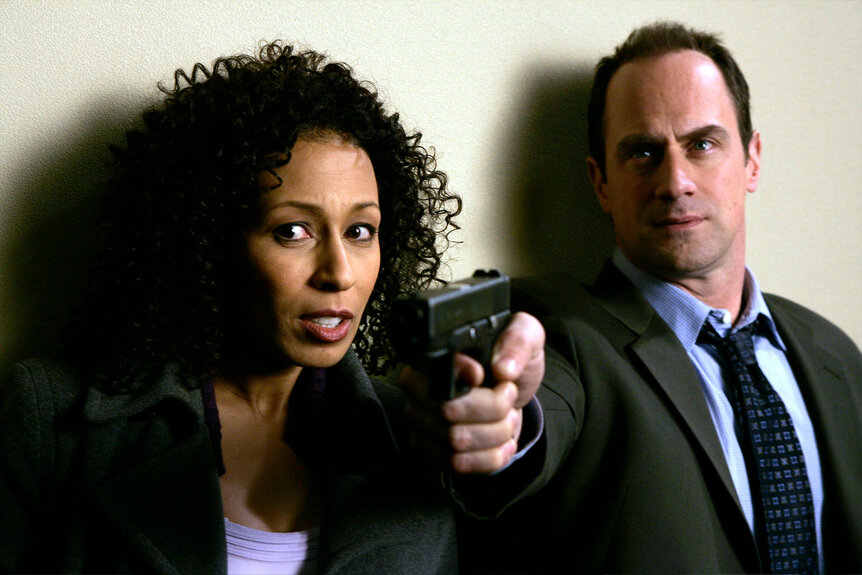 M.E. Melinda Warner (Tamara Tunie) appears alongside Detective Stabler (Christopher Meloni) in Law & Order: SVU