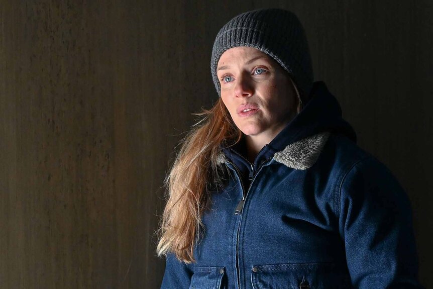 Hailey Upton wears a blue jacket and grey beanie on Chicago P.D. Season 11 Episode 1.