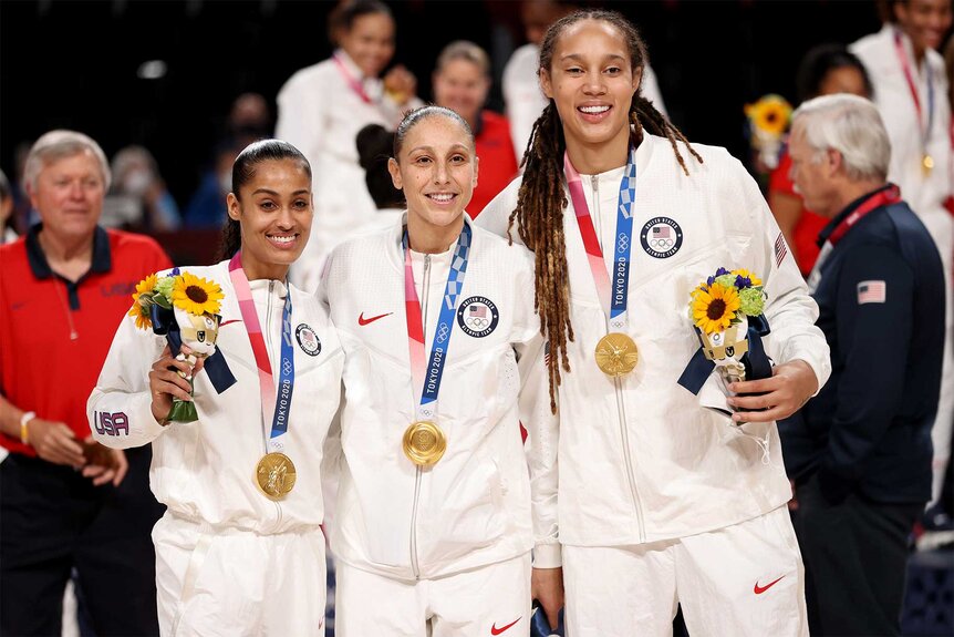 Brittney Griner, Skylar Diggins and Diana Taurasi pose during the medal ceremony for the 2020 olympics