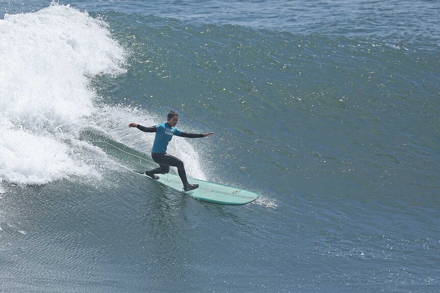 Chloe Calmon of Brazil competes on the Final of Surf longboard