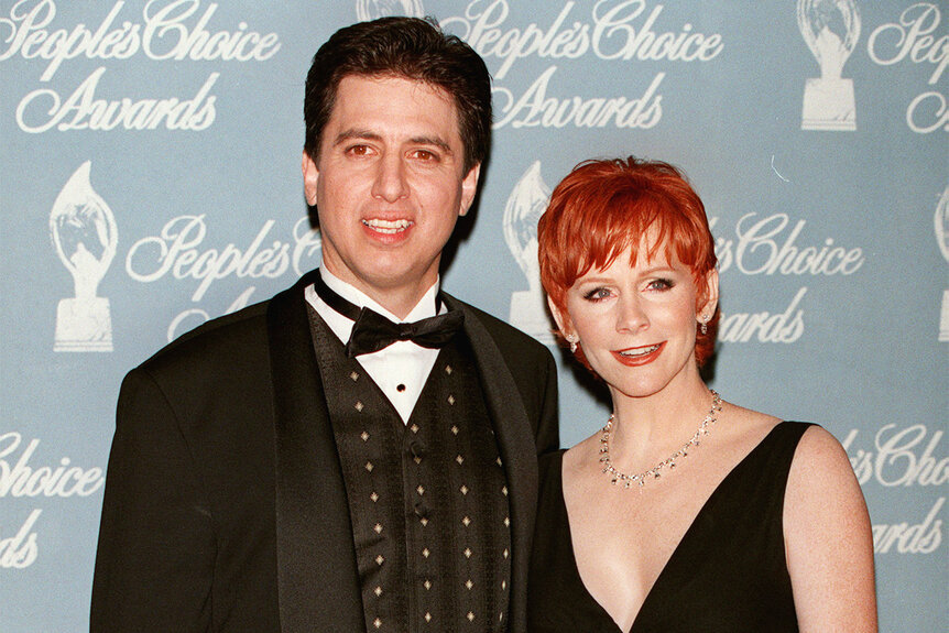 Ray Romano and Reba Mcentire attend the People Choice Awards in 1999