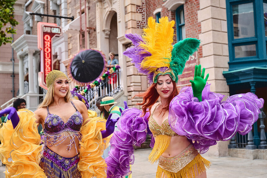 Universal Orlando Mardi Gras performs dance in the street