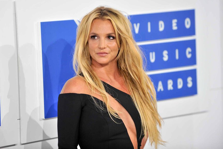 Britney Spears swears a black dress at the MVAs.