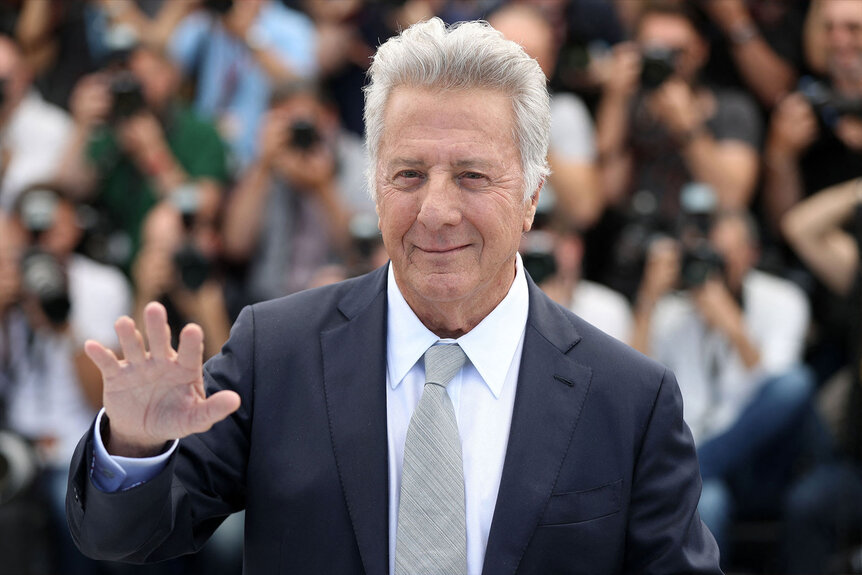 Dustin Hoffman waves during a photocall for the film 'The Meyerowitz Stories (New and Selected)