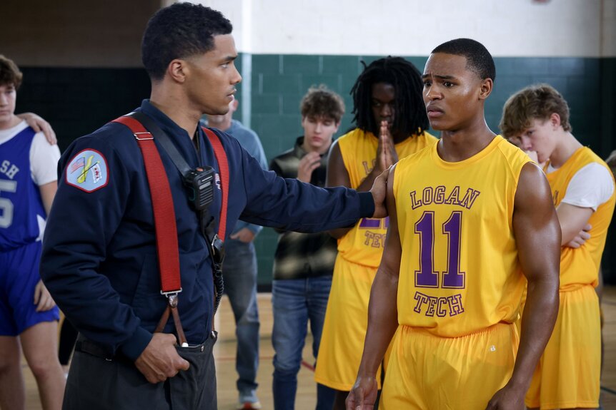 Derrick Gibson comforts a basketball player in Chicago Fire Episode 1205.