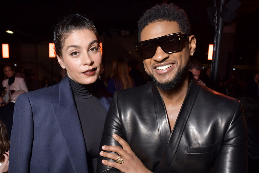 Jenn Goicoechea and Usher sit in the front row of Balmain's 2020 Paris Fashion Week show