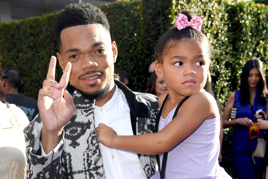 Chance The Rapper and Kensli Bennett attend the premiere of Disney's "The Lion King"