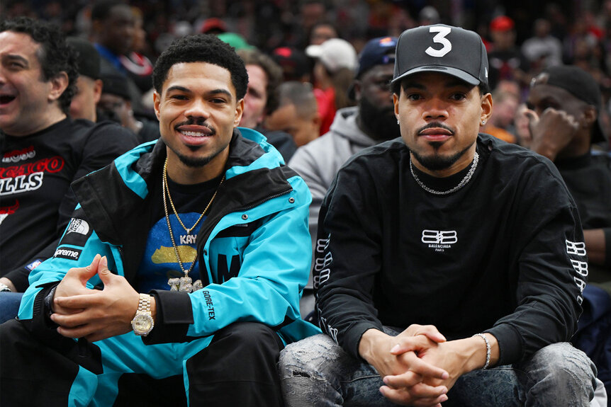 Chance the Rapper and brother Taylor Bennett sit courtside at the game between the Chicago Bulls and the Phoenix Suns at United Center on March 03, 2023