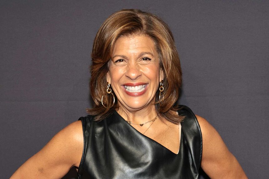 Hoda Kotb smiles in a black leather dress on the carpet for the 27th Annual Webby Awards