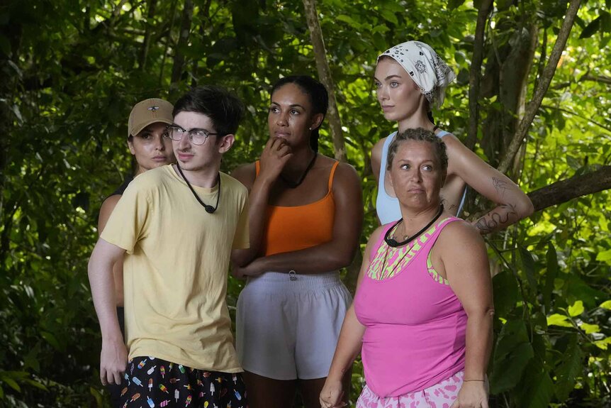 Miranda Harrison, Aron Barbell, Jordan Fowler, Alyssa Klinzing, and Amy McCoy stand outside in Deal or No Deal Island Episode 104.