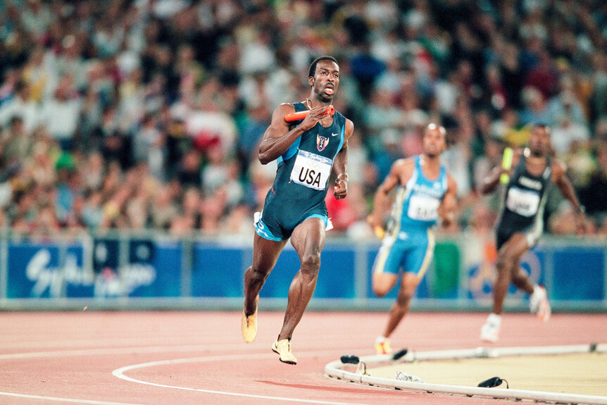 Michael Johnson of the USA in action during the Men's 4x400m Relay Final at the Olympic Stadium during the Sydney 2000 Olympic Games