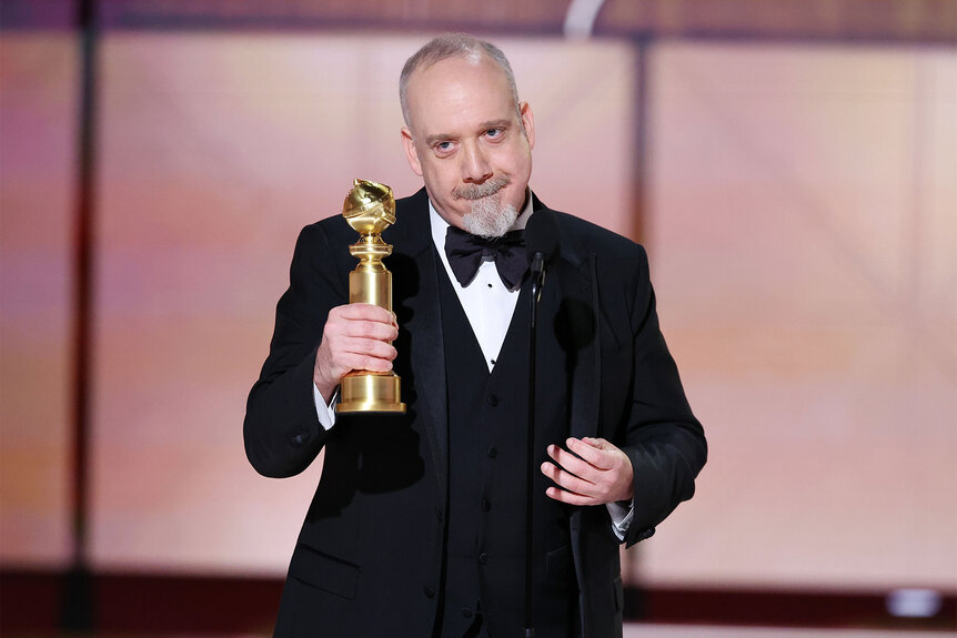Paul Giamatti accepts the award for Best Performance by a Male Actor in a Motion Picture Musical or Comedy for "The Holdovers" at the 81st Golden Globe Awards
