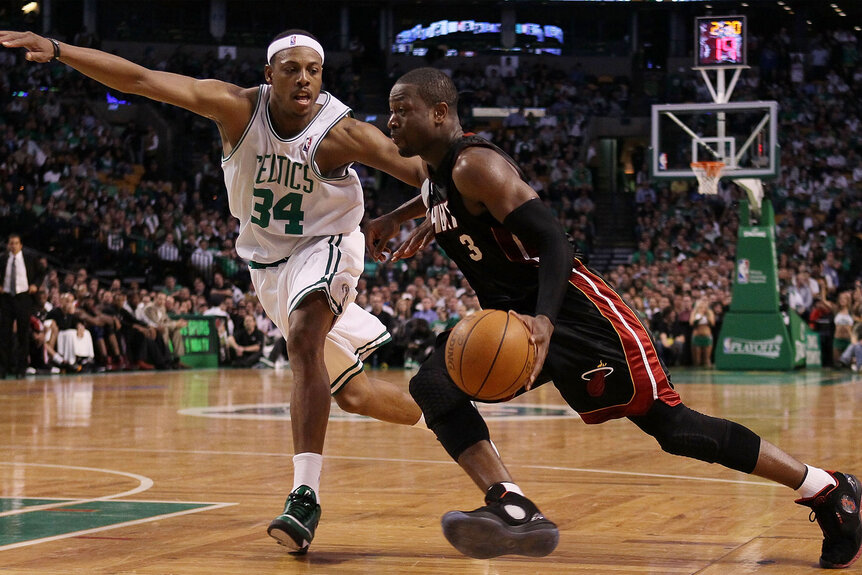 Dwyane Wade heads for the net as Paul Pierce defends during Game Five of the Eastern Conference Quarterfinals of the 2010 NBA playoffs