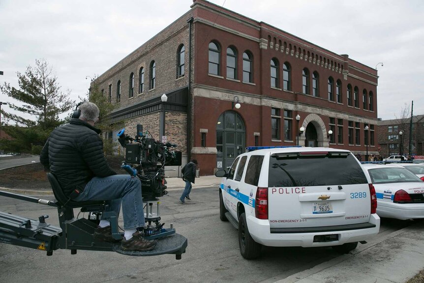 A camera operator works behind the scenes of Chicago P.D.