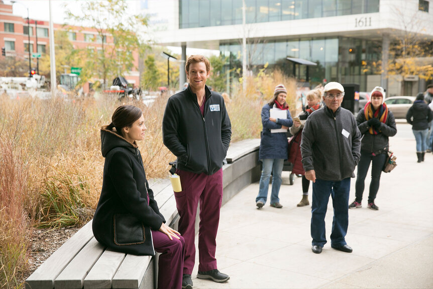 Actors and crew on set in between takes of Chicago Med Season 1 Episode 4