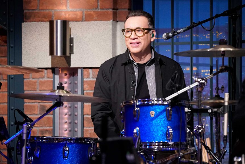 Fred Armisen performs with the 8g Band on Late Night With Seth Meyers