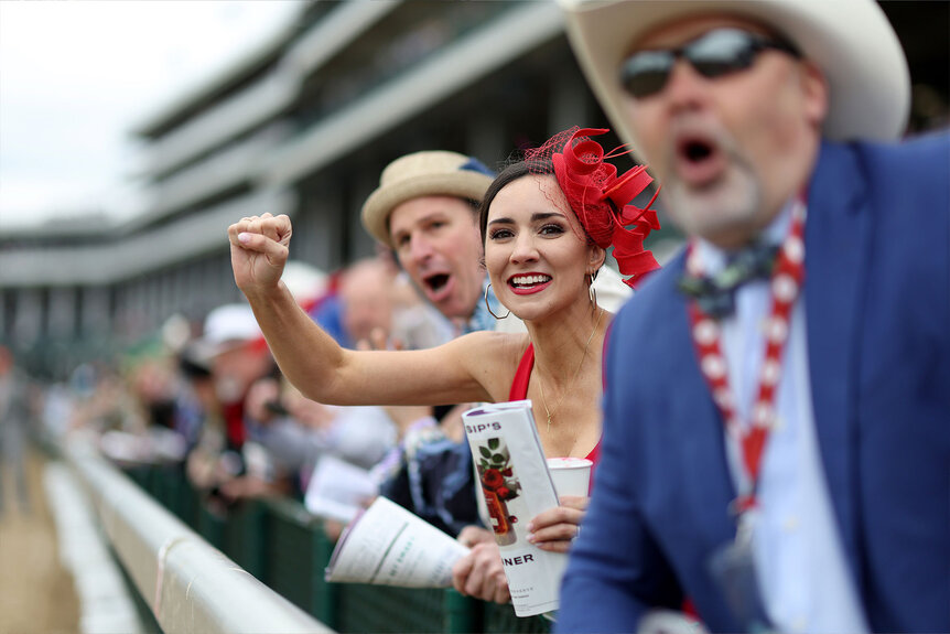Fans cheer during the running of the 148th Kentucky Derby