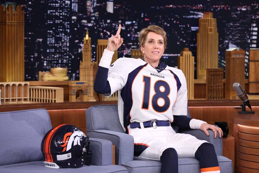 Kristen Wiig is dressed as Peyton Manning on The Tonight Show Starring Jimmy Fallon.