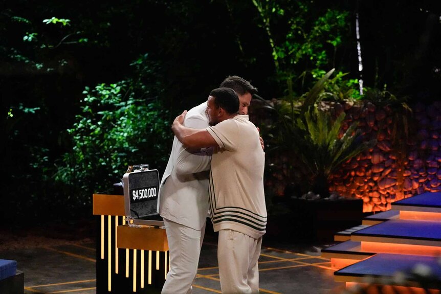 Joe Manganiello hugs Nicholas Grasso in Deal or No Deal Island Episode 109.