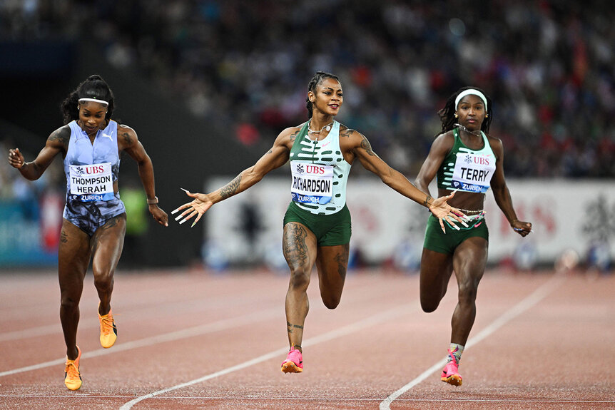 Paris 2024 Sha'Carri RichardsonSha'Carri Richardson celebrates as she crosses the finish line to win the women's 100m final during the Diamond League athletics meeting