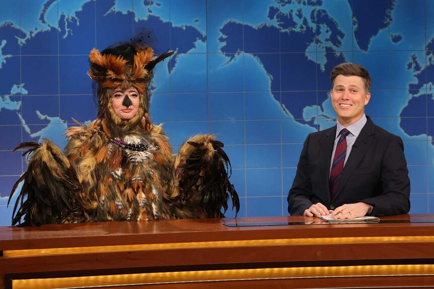 Sarah Sherman dressed as flaco the owl and Colin Jost during Saturday Night Live episode 1859