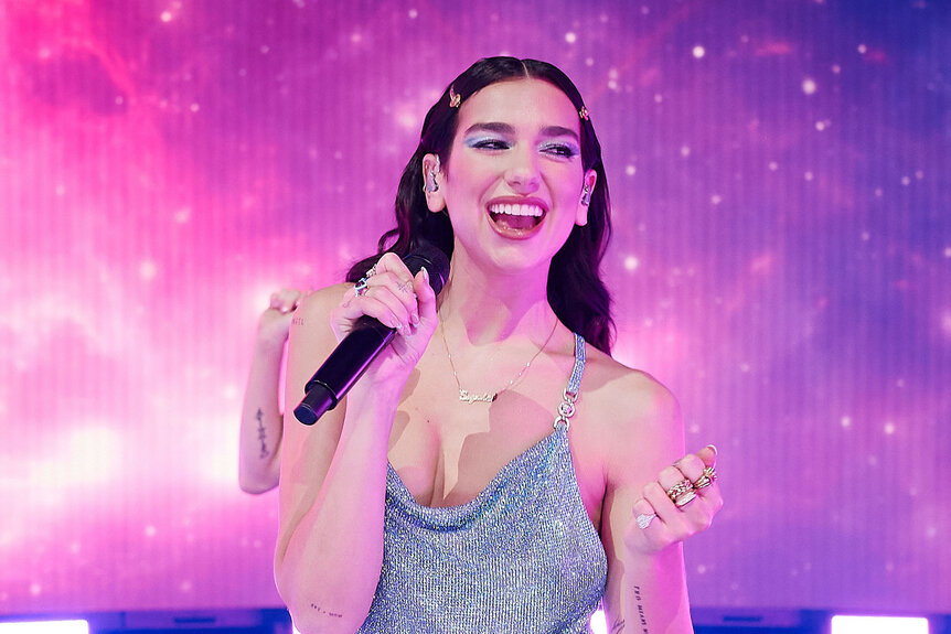 Dua Lipa performing onstage at the 2020 American Music Awards