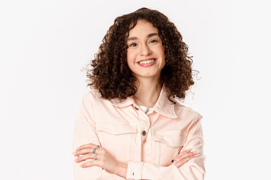 Hailey Mia posing for a promotional image for The Voice