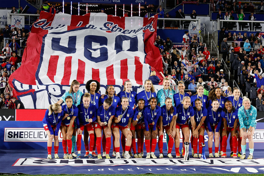 The US Women's National Team pose together after the SheBelieves Cup final football match