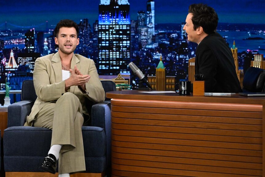 Watch Luke Newton Perform "Espresso" Colin BridgertonStyle NBC Insider