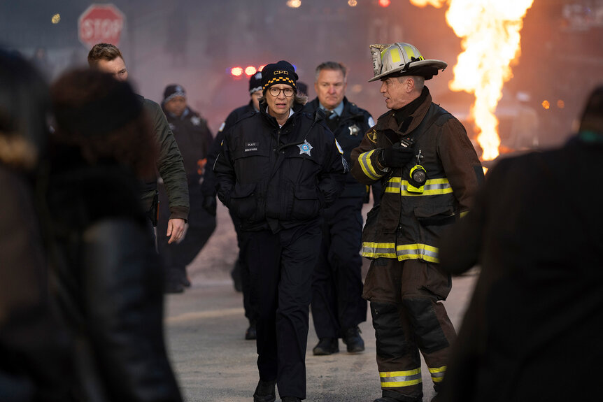 Trudy Platt and Dom Pascal walk together outside on Chicago Fire Season 13 Episode 11.