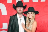 Lainey Wilson and Devlin Hodges pose together at the CMT awards